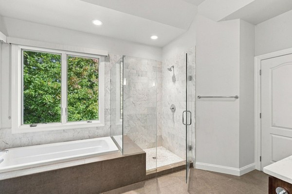Soaking tub and glass shower