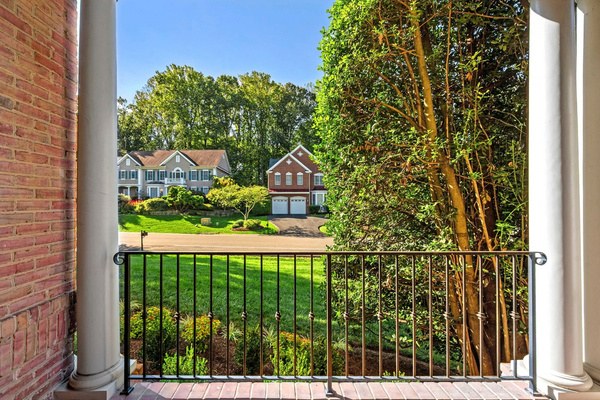 Private, tree-lined fenced backyard